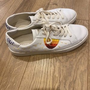 Sneakers with art stitching